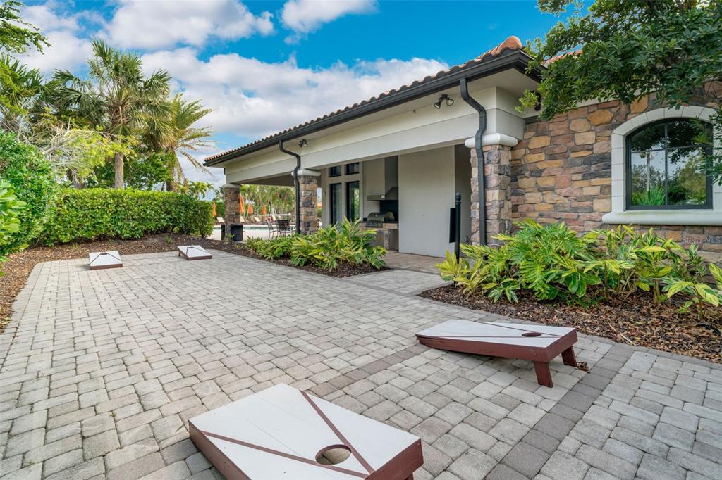5804 Semolino Street Nokomis, FL 34275 - Photo 48 of 53 a front view of a house with a yard