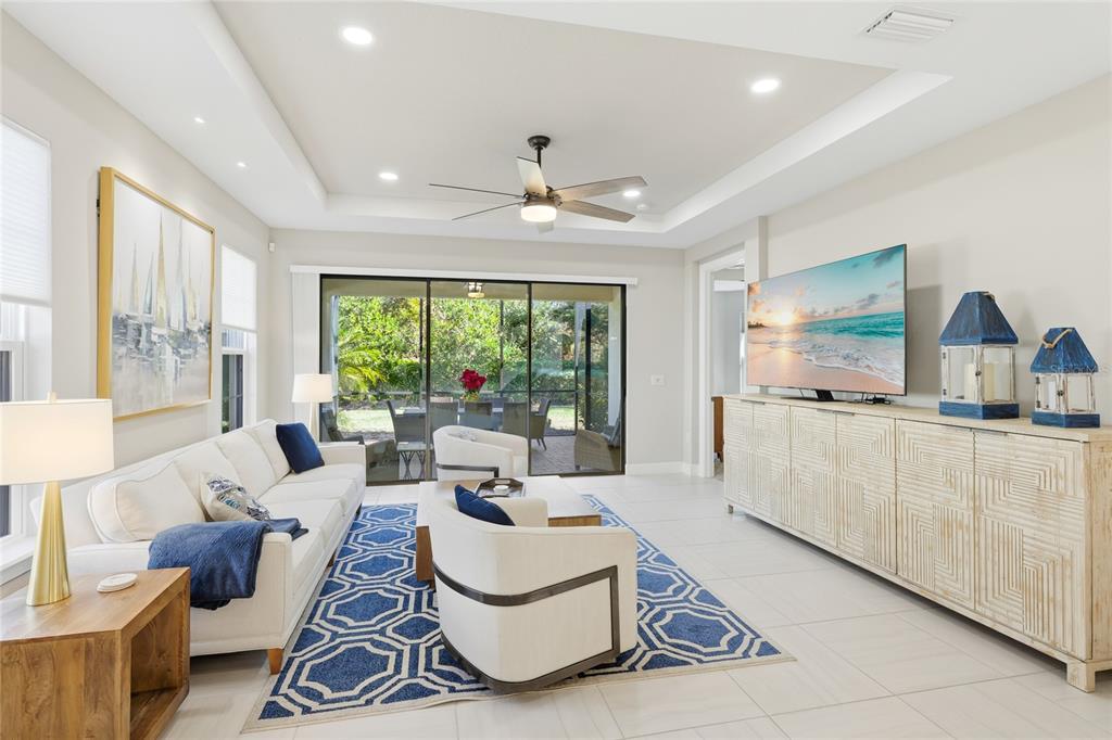 5804 Semolino Street Nokomis, FL 34275 - Photo 9 of 53 a living room with furniture and a large window