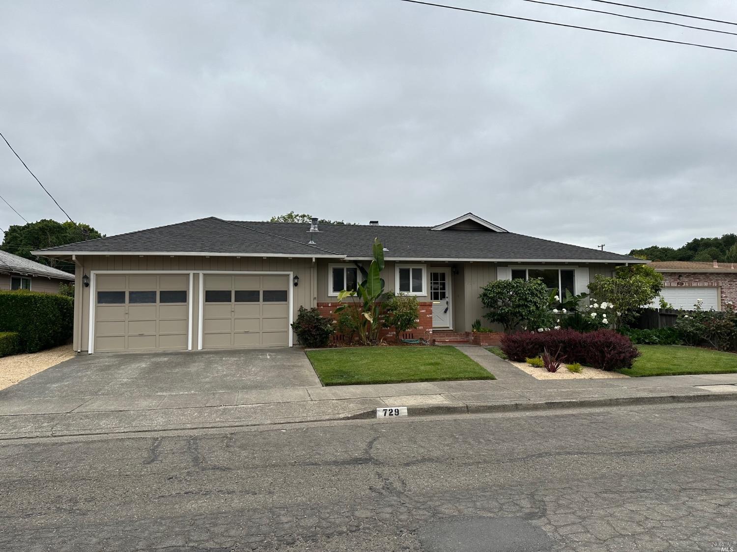 729 Karen Way Santa Rosa, CA 95404 - Photo 1 of 1 front view of a house with a yard