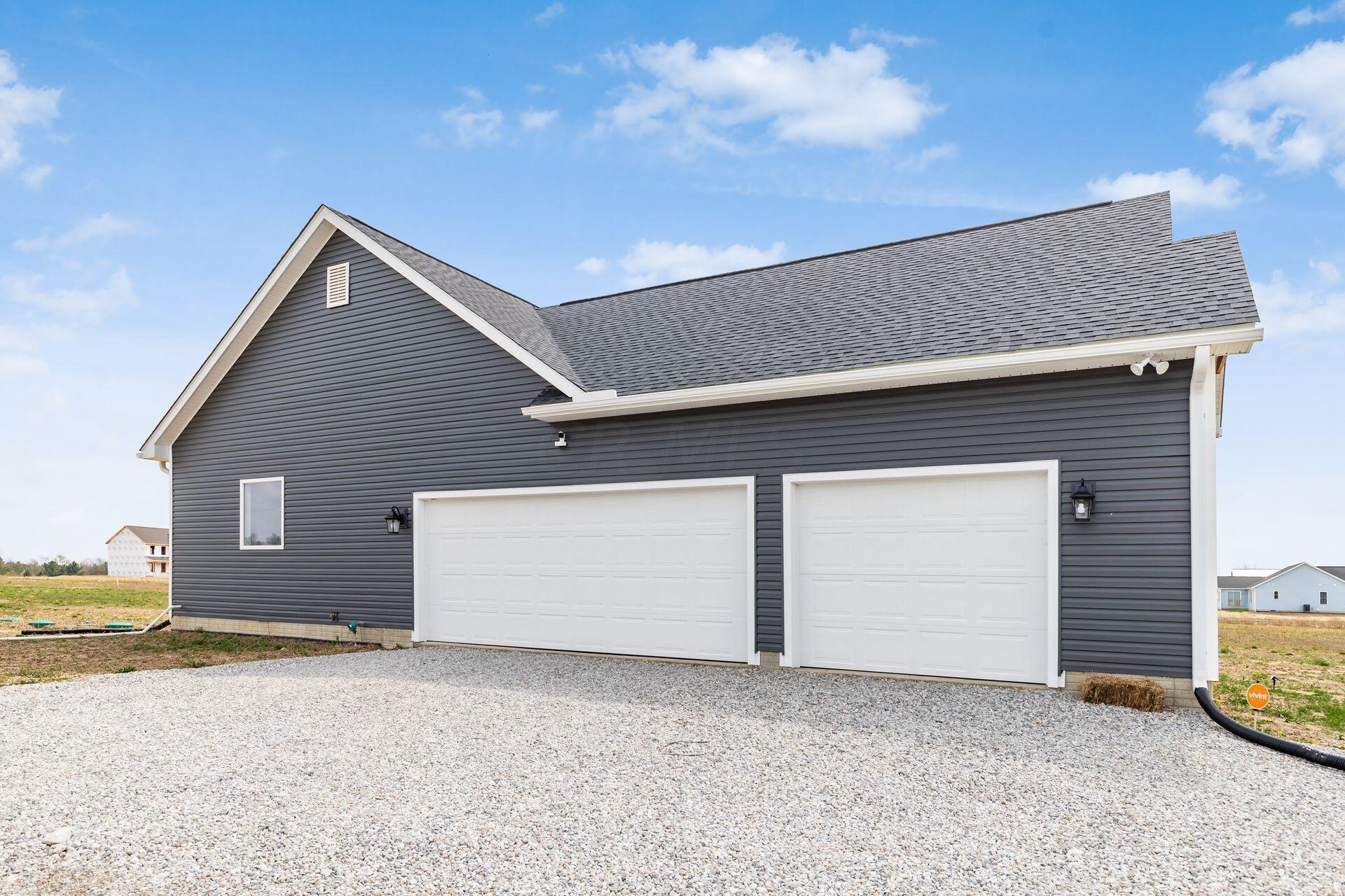 2064 Troy Road Delaware, OH 43015 - Photo 41 of 52 3-car, attached garage.