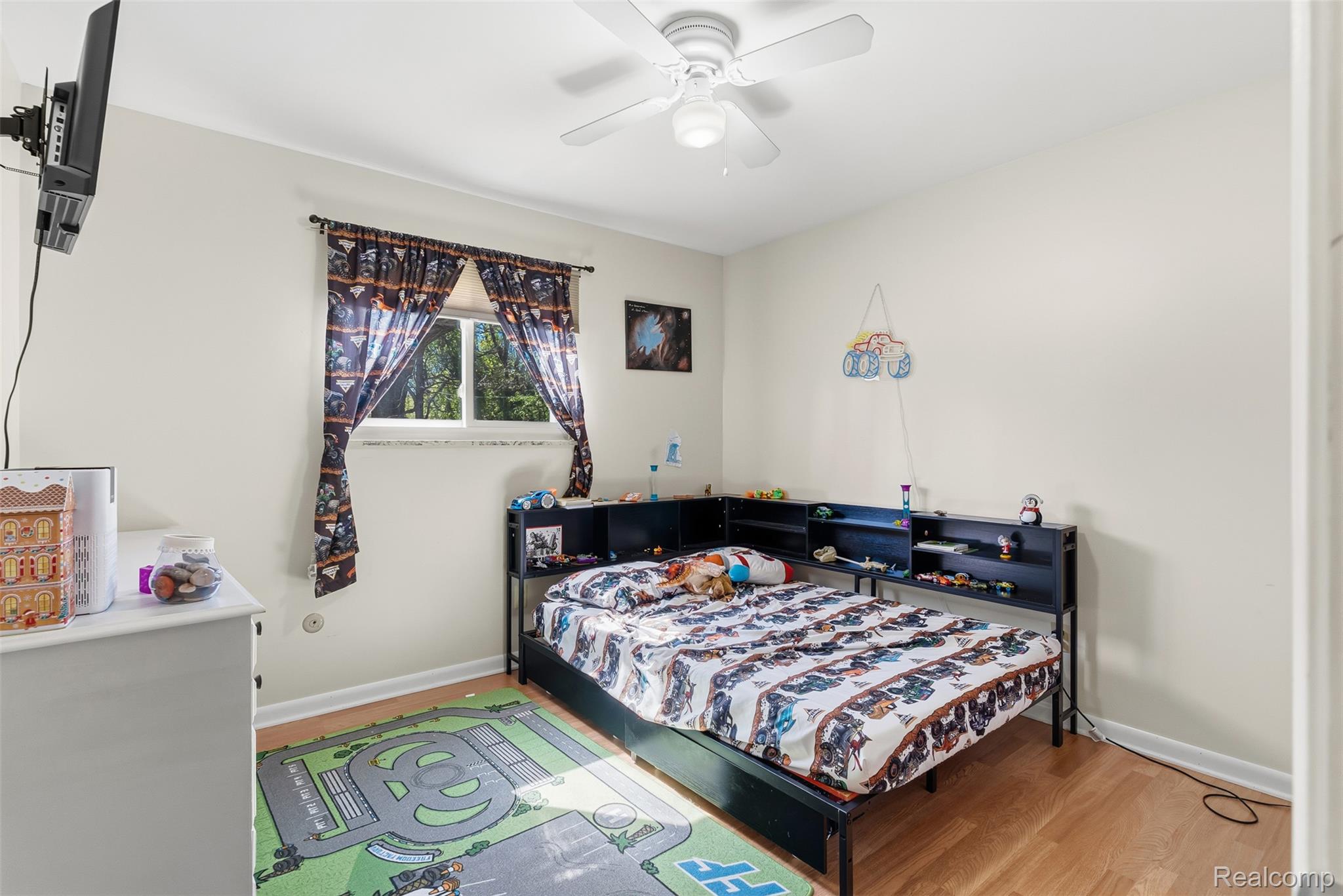 14433 Tuscola Road Clio, MI 48420 - Photo 26 of 43 Bedroom featuring a ceiling fan and light wood-type flooring