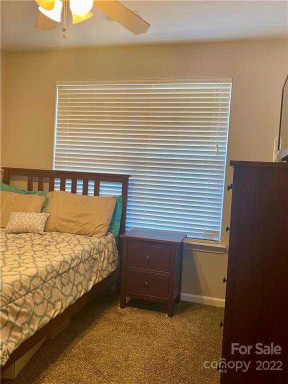 514 Bent Leaf Court, Unit 11 Fort Mill, SC 29708 - Photo 15 of 22 a bedroom with a bed and a window