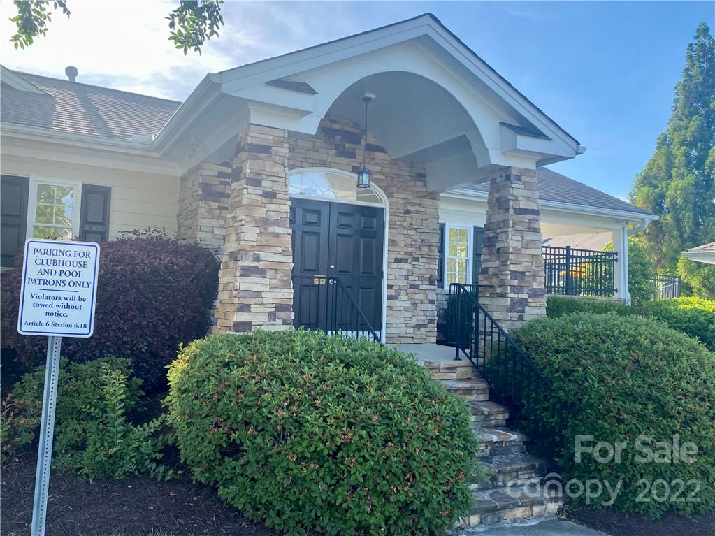 514 Bent Leaf Court, Unit 11 Fort Mill, SC 29708 - Photo 21 of 22 a front view of a house with garden
