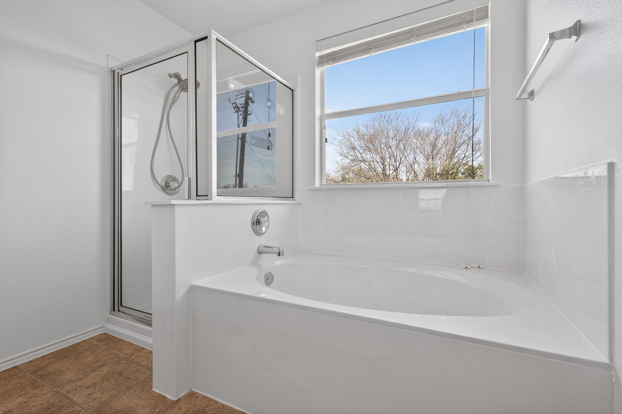 13629 Coomer Path Pflugerville, TX 78660 - Photo 15 of 30 Bathroom featuring a shower stall, a bath, and tile patterned floors
