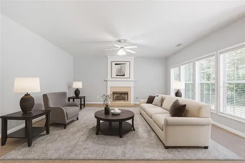 a kitchen with stainless steel appliances white cabinets and a sink