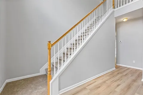 a bathroom with a sink double vanity and a mirror