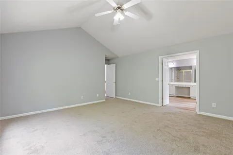 a view of a garden with a building