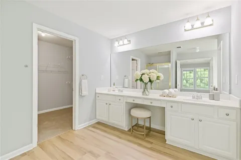 an aerial view of a house with pool outdoor seating and yard