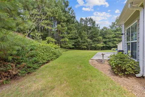 an aerial view of residential house with outdoor space