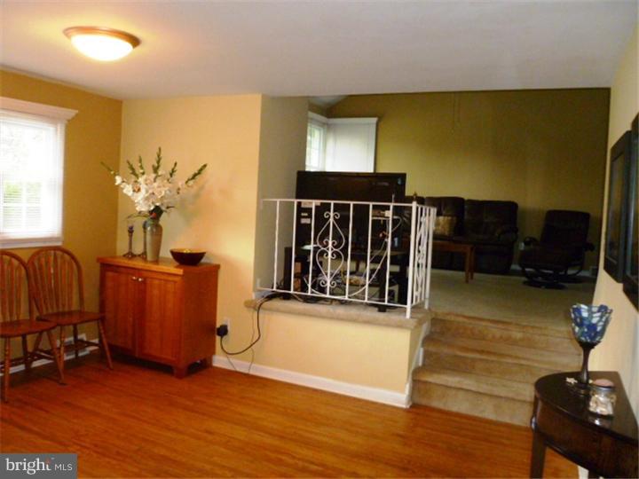 10 Briar Road Cherry Hill, NJ 08034 - Photo 12 of 25 a living room with furniture and a flat screen tv