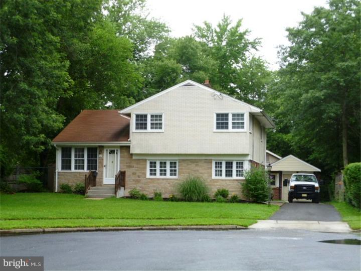 10 Briar Road Cherry Hill, NJ 08034 - Photo 3 of 25 a front view of a house with a garden