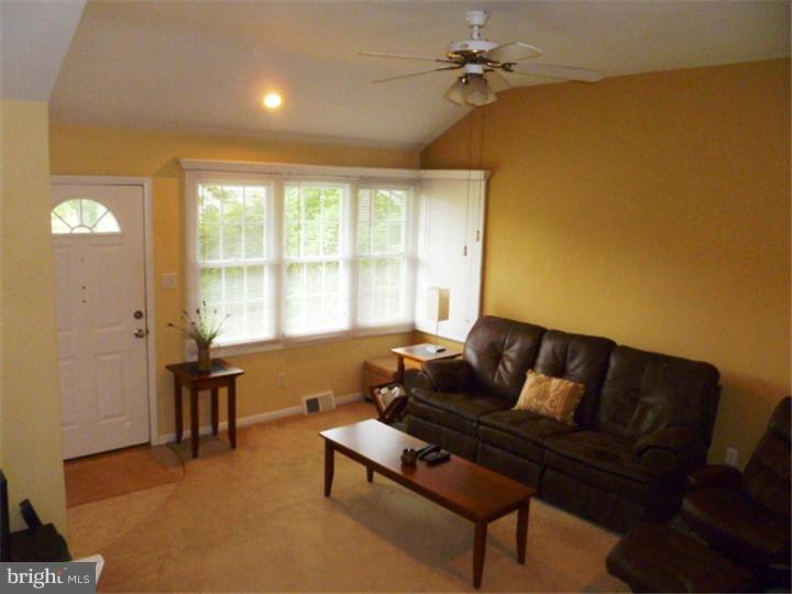 10 Briar Road Cherry Hill, NJ 08034 - Photo 4 of 25 a living room with furniture and a window