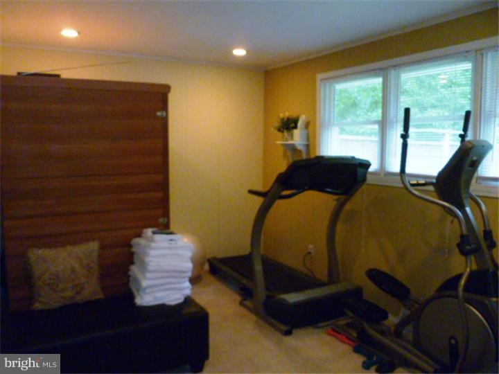 10 Briar Road Cherry Hill, NJ 08034 - Photo 6 of 25 a bedroom with a bed and wooden floor