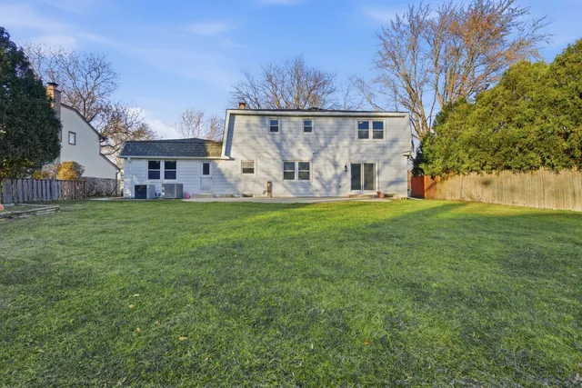 an aerial view of residential house with outdoor space