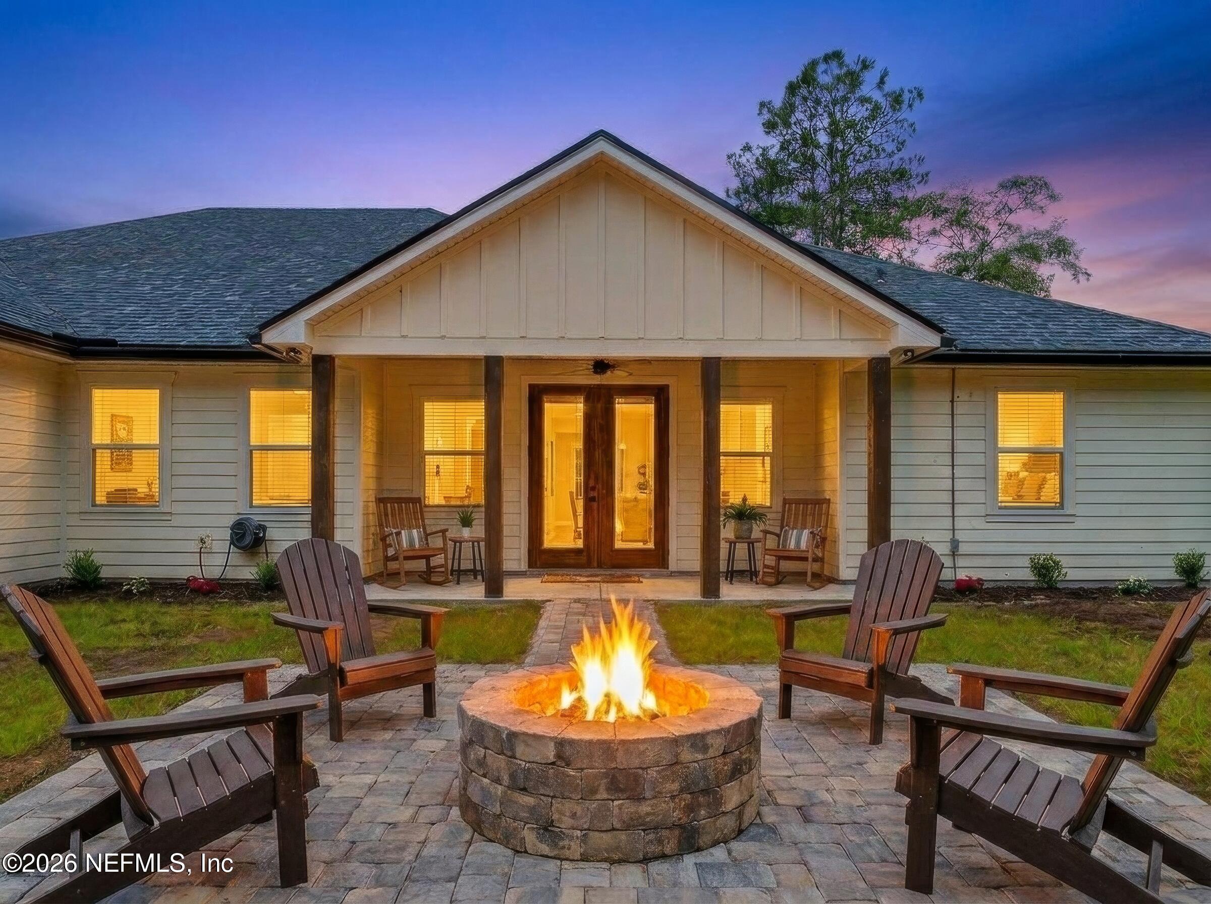 44024 Breezy Lane Callahan, FL 32011 - Photo 66 of 76 fire-pit-twilight-staged-upscaled