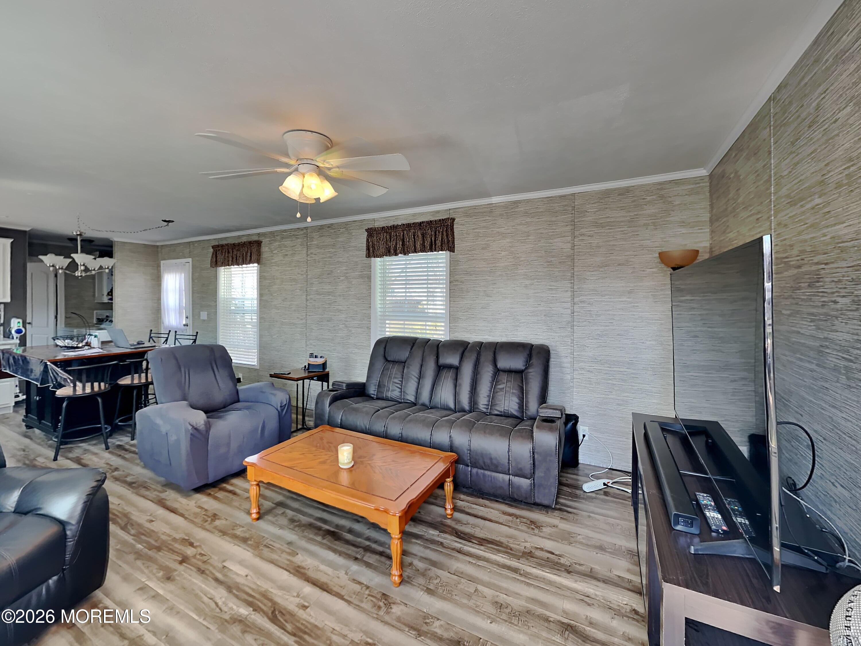 411 4th Street Jackson, NJ 08527 - Photo 3 of 15 a living room with furniture and wooden floor