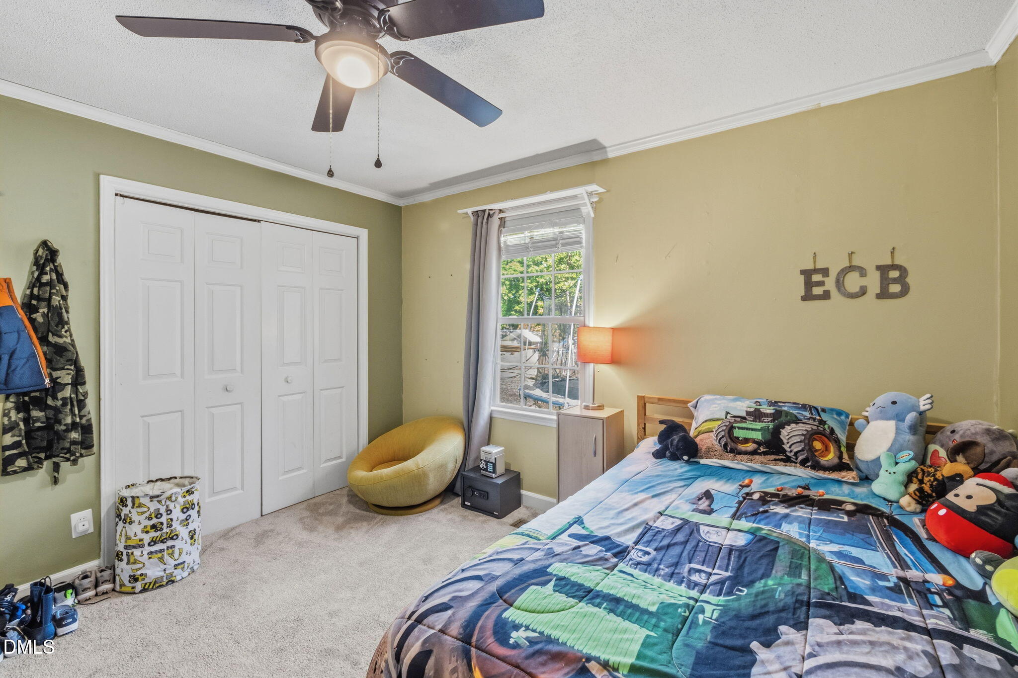 107 East F Street Butner, NC 27509 - Photo 26 of 47 a bedroom with a bed and a window