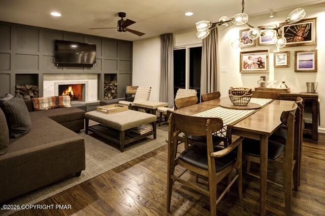 137 Indian Trail Road Jim Thorpe, PA 18229 - Photo 5 of 12 a living room with furniture a flat screen tv and kitchen view