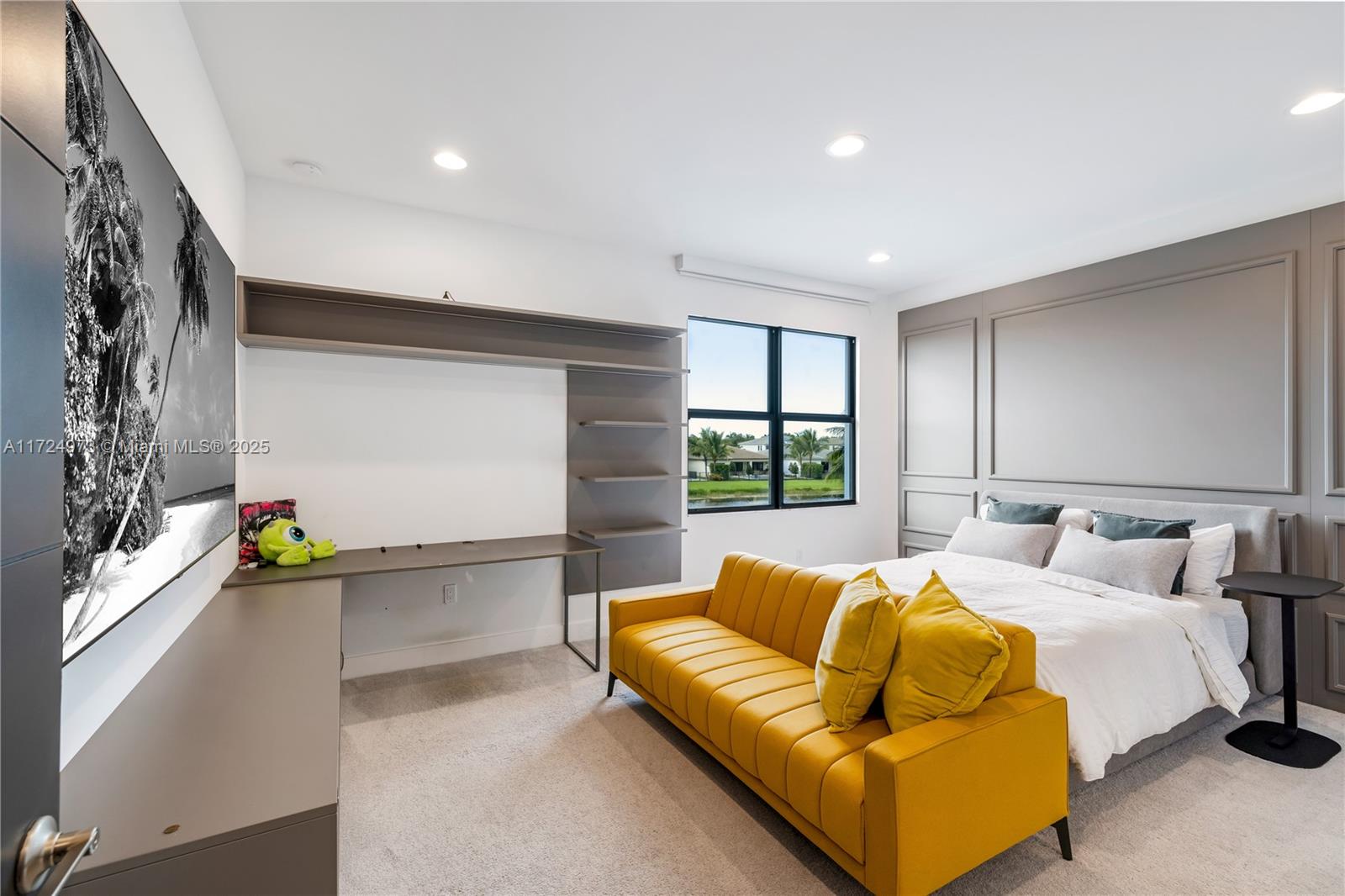 8853 New River Falls Road Boca Raton, FL 33496 - Photo 17 of 35 a bedroom with a bed and a couch