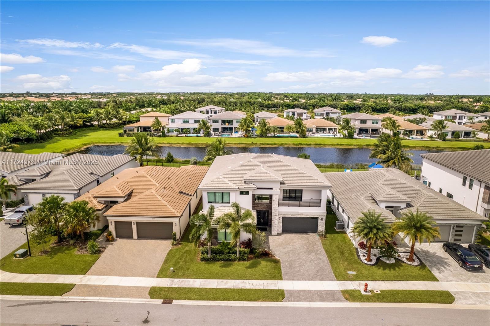8853 New River Falls Road Boca Raton, FL 33496 - Photo 22 of 35 an aerial view of a house with a garden and lake view