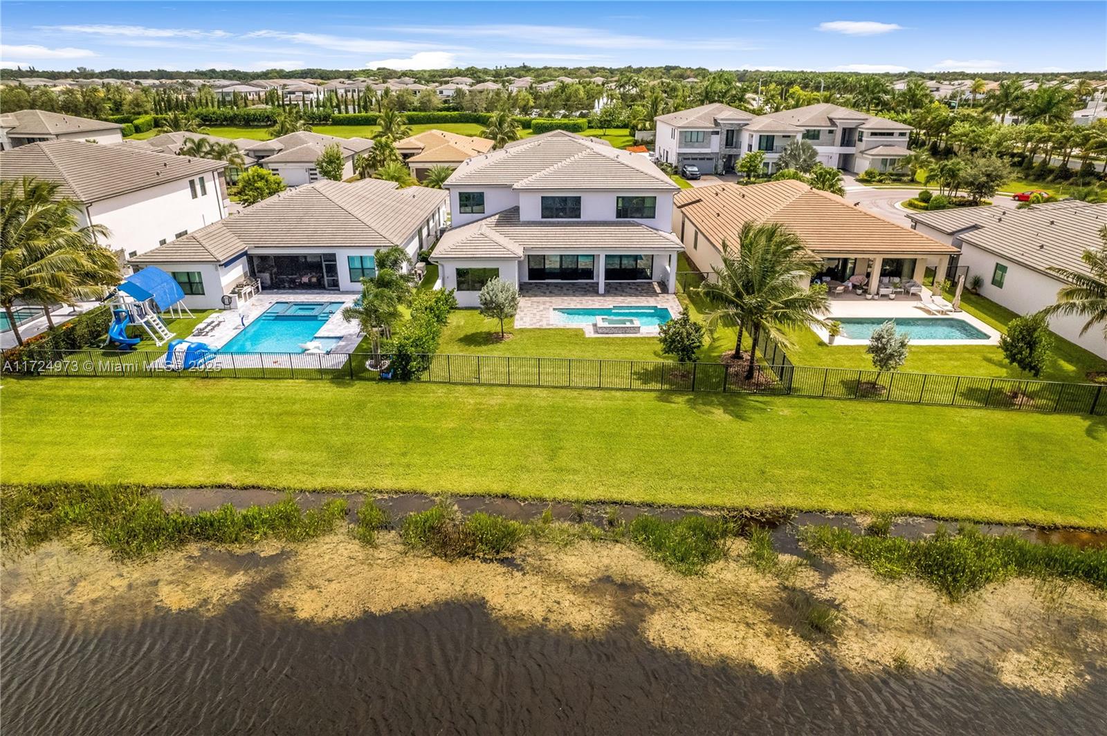 8853 New River Falls Road Boca Raton, FL 33496 - Photo 23 of 35 a view of a lake with houses