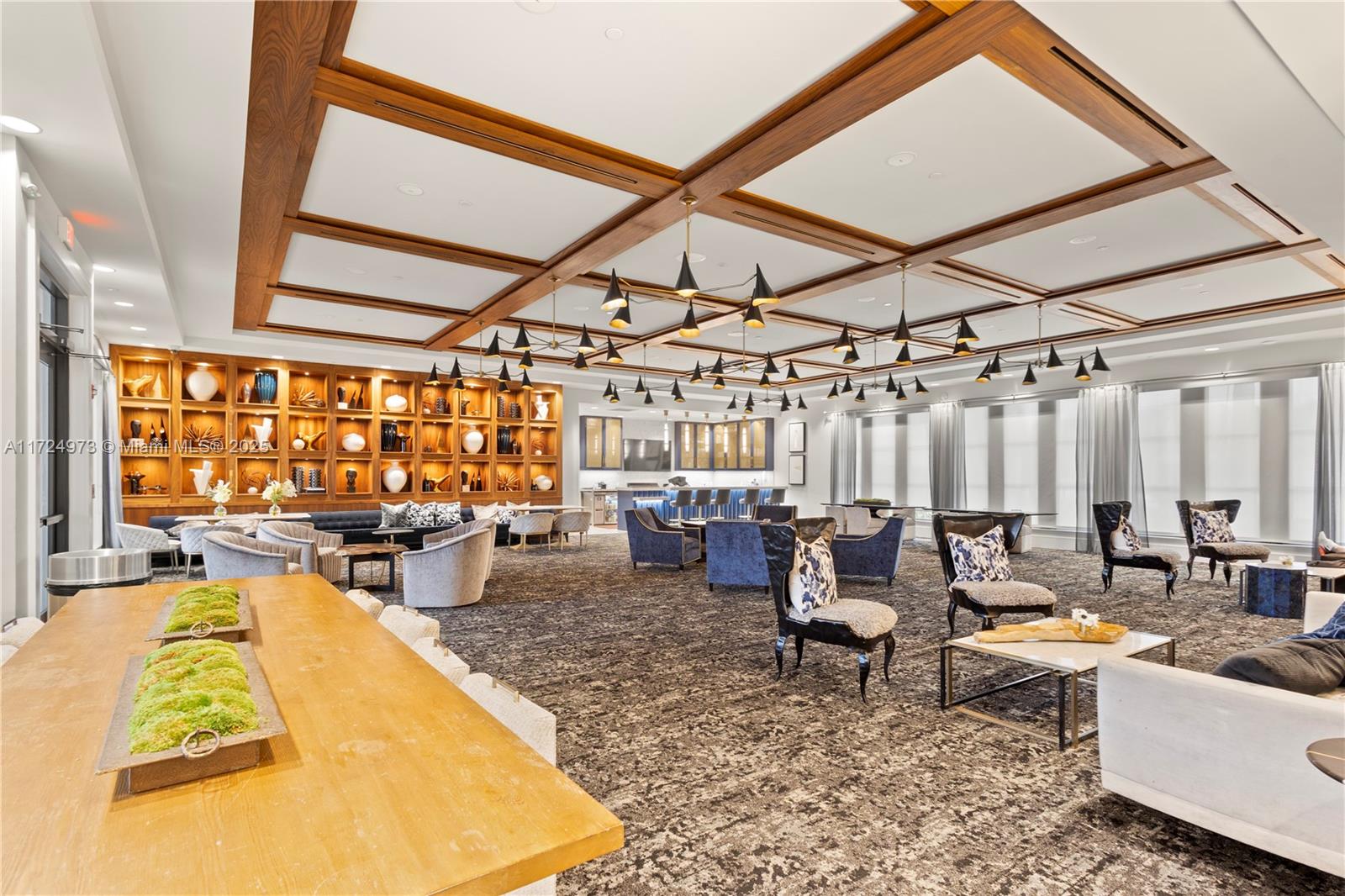 8853 New River Falls Road Boca Raton, FL 33496 - Photo 32 of 35 a living room with furniture and a flat screen tv