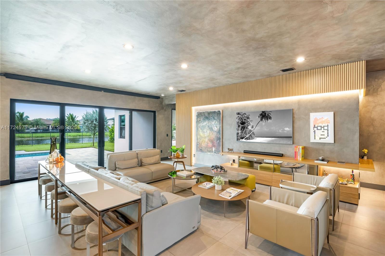 8853 New River Falls Road Boca Raton, FL 33496 - Photo 4 of 35 a living room with furniture and a large window