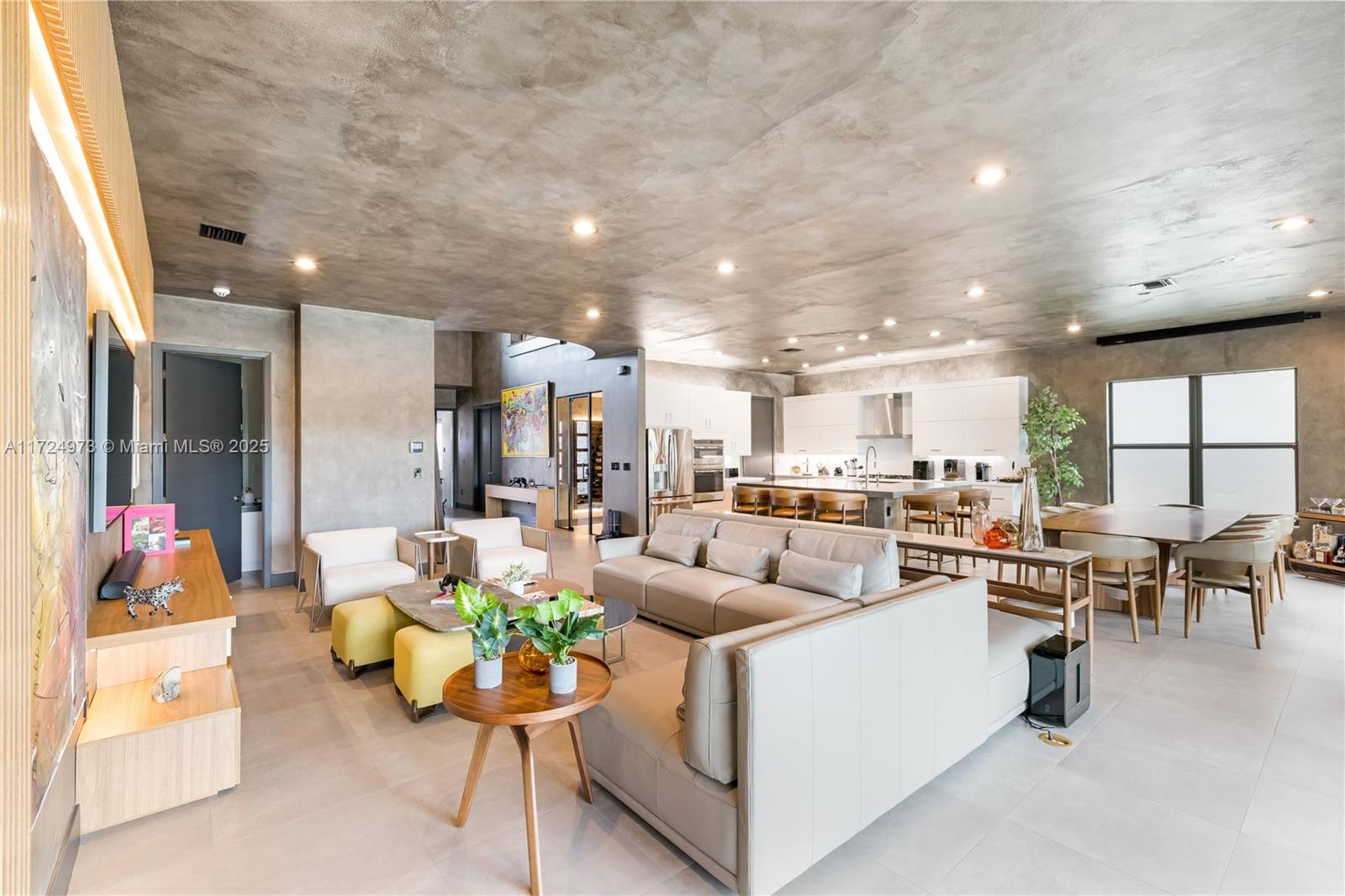 8853 New River Falls Road Boca Raton, FL 33496 - Photo 6 of 35 a living room with furniture kitchen and a table