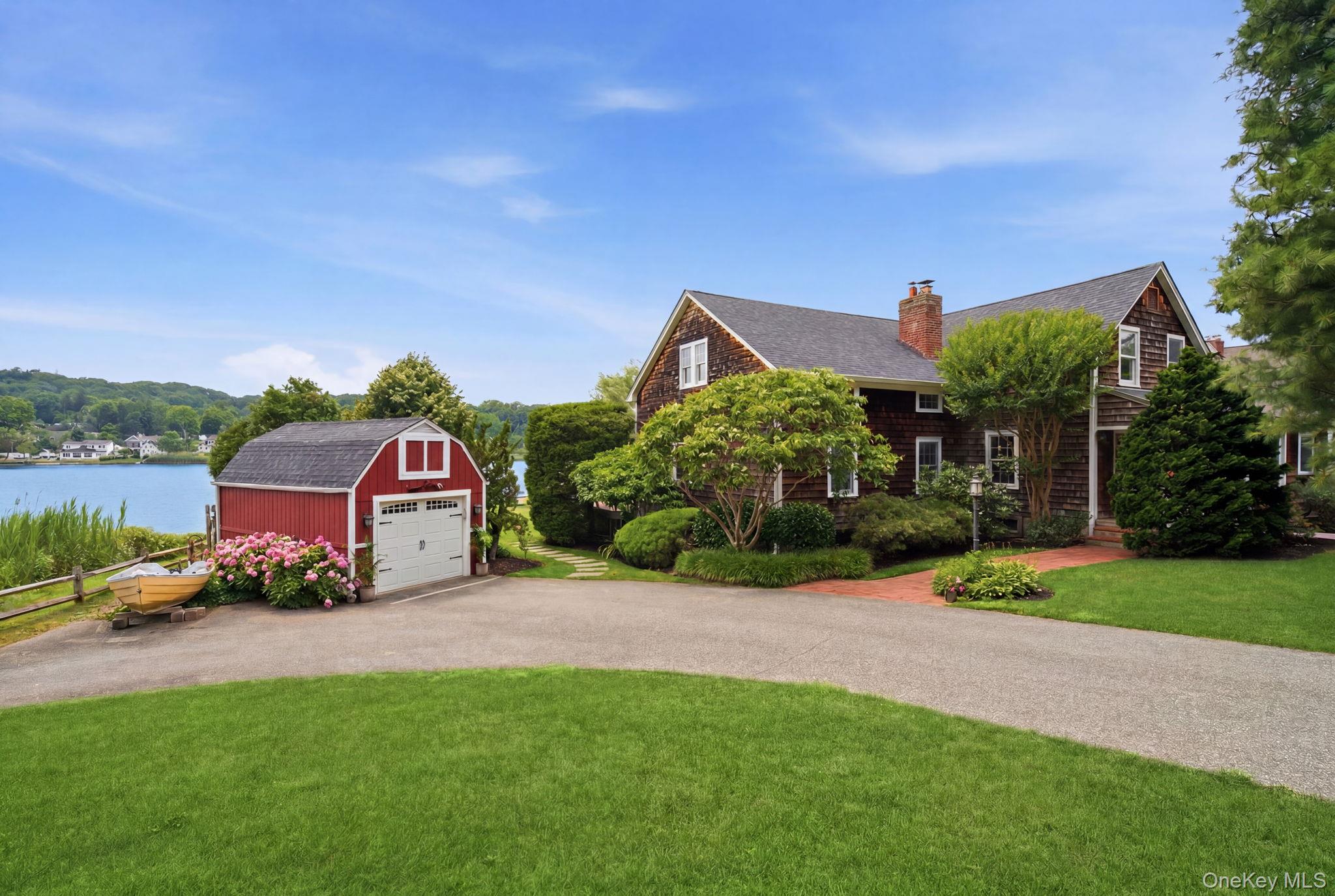 33 Prospect Road Centerport, NY 11721 - Photo 3 of 48 Driveway with ample parking and 1-car garage.