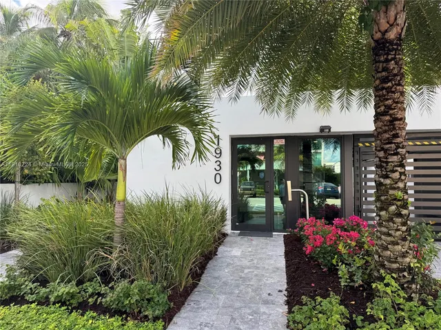 a view of a backyard with garden