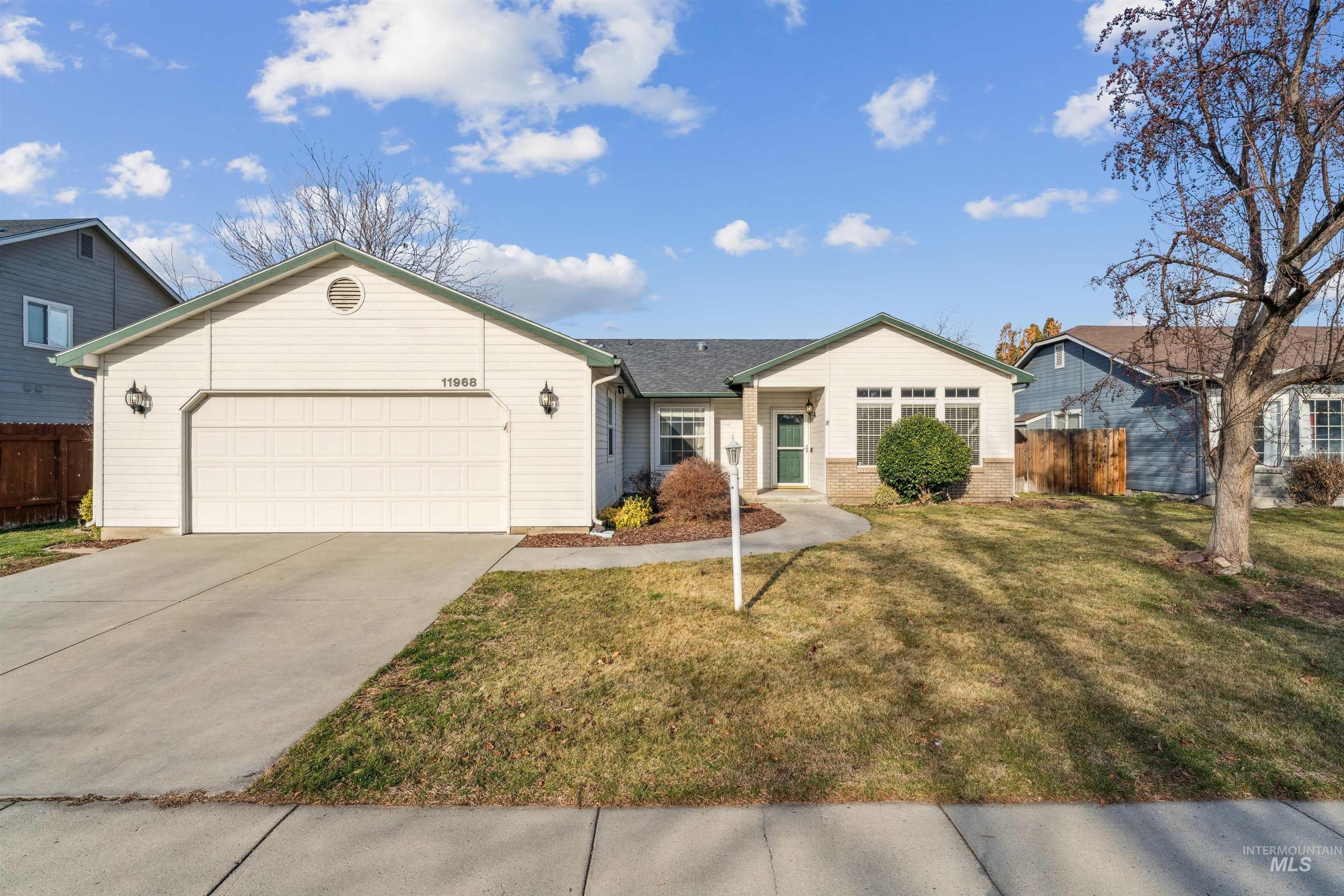 11968 West Bronte Street Boise, ID 83709 - Photo 1 of 48 Single story home featuring concrete driveway and an attached garage