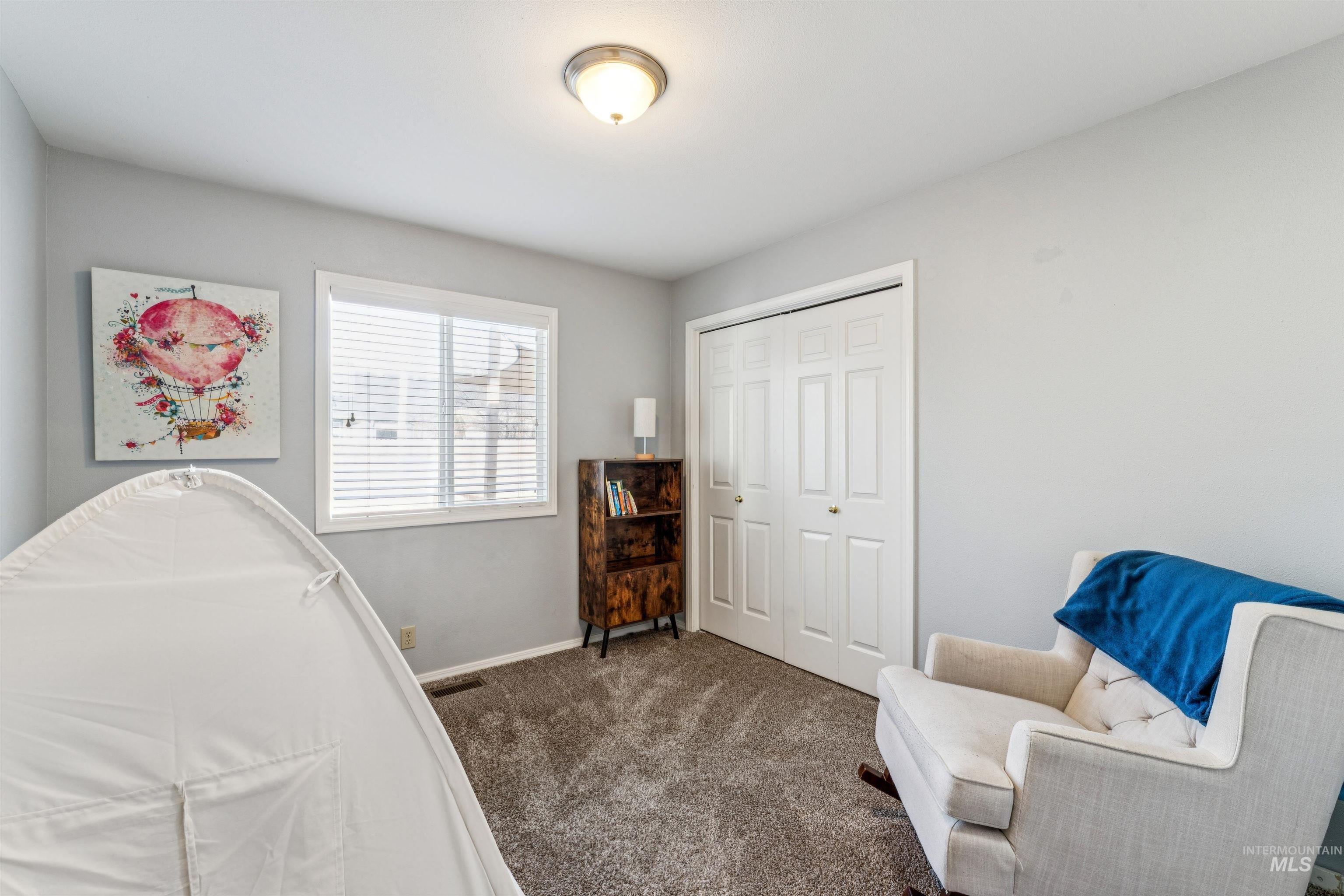 11968 West Bronte Street Boise, ID 83709 - Photo 31 of 48 Bedroom with carpet floors and a closet