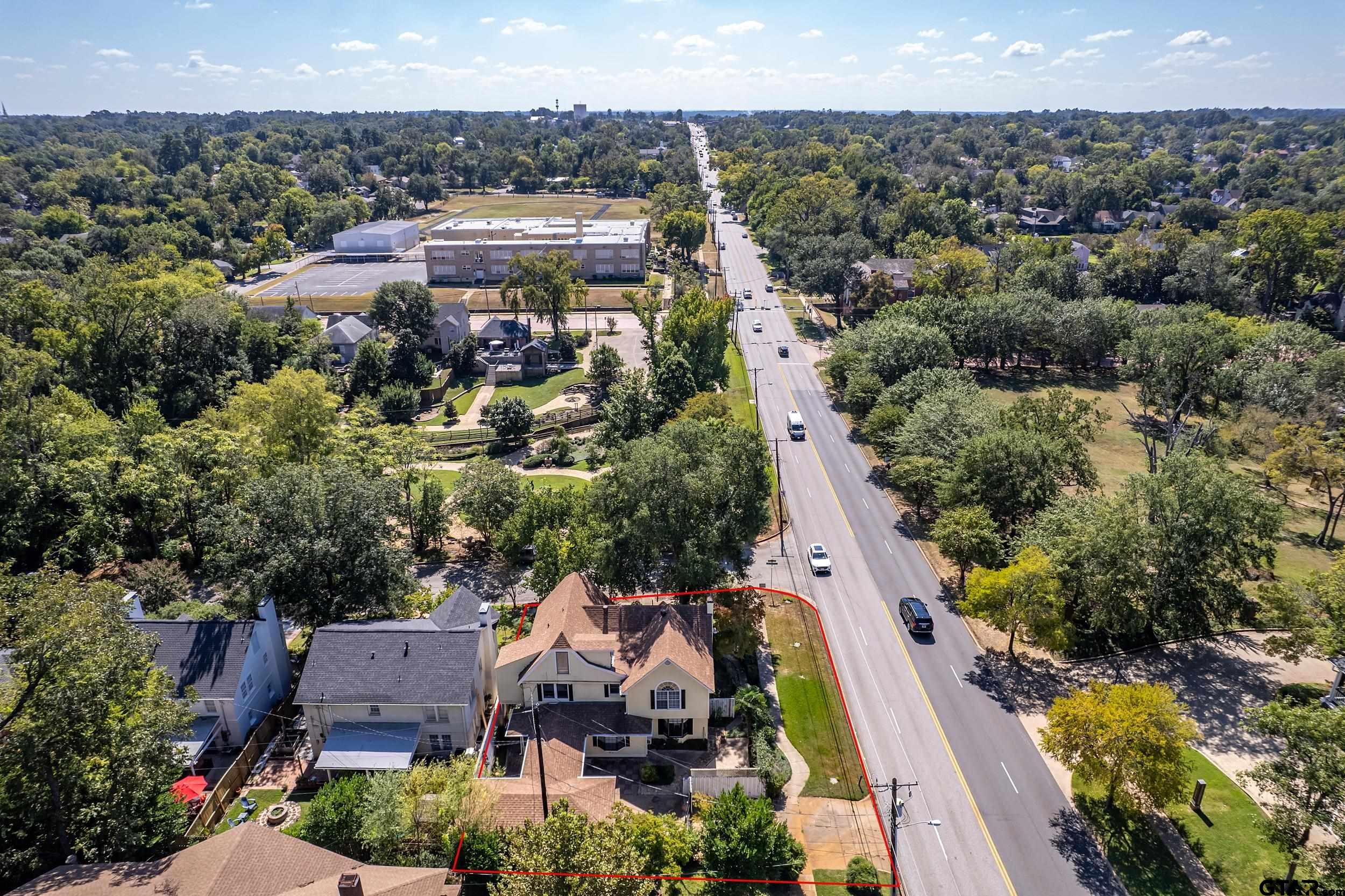 145 Rowland Place Tyler, TX 75701 - Photo 3 of 43 an aerial view of residential houses with outdoor space