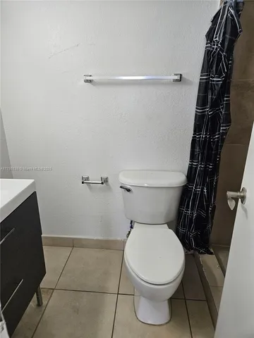 a bathroom with a toilet