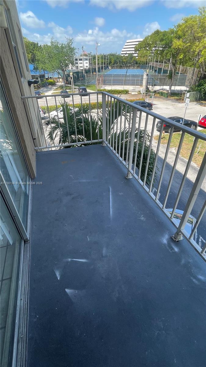 1805 Sans Souci Boulevard, Unit 302R North Miami, FL 33181 - Photo 24 of 33 a view of a balcony with city view