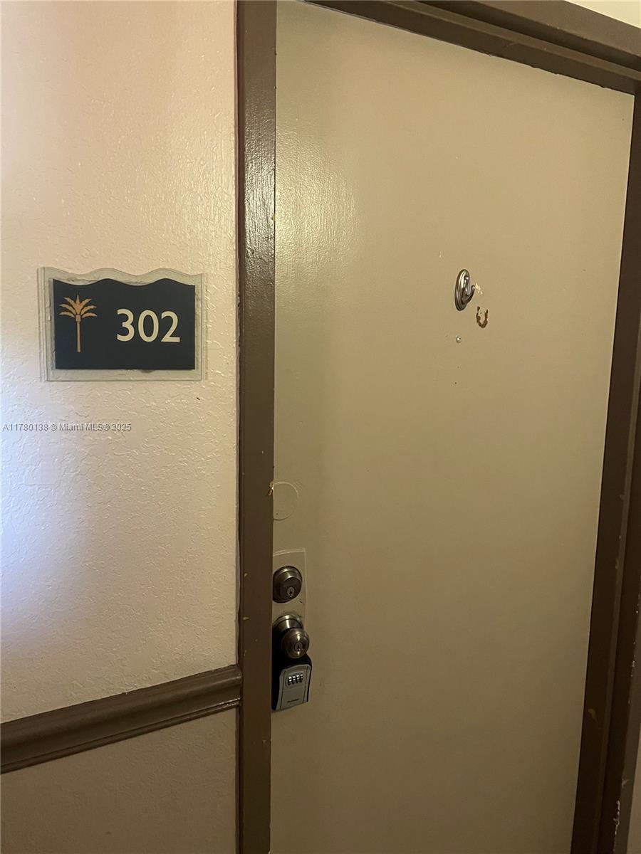 1805 Sans Souci Boulevard, Unit 302R North Miami, FL 33181 - Photo 4 of 33 a view of a closet