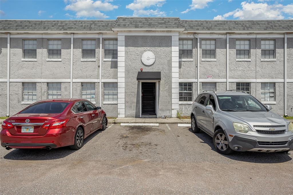 2767 L B McLeod Road, Unit D Orlando, FL 32805 - Photo 1 of 1 a car parked in front of a house