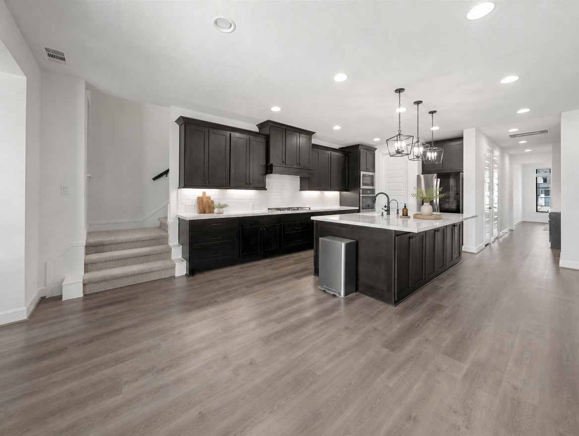 1440 Riva Ridge Drive Leander, TX 78641 - Photo 12 of 37 Culinary excellence awaits in this open-concept kitchen with a large island and ample counter space.