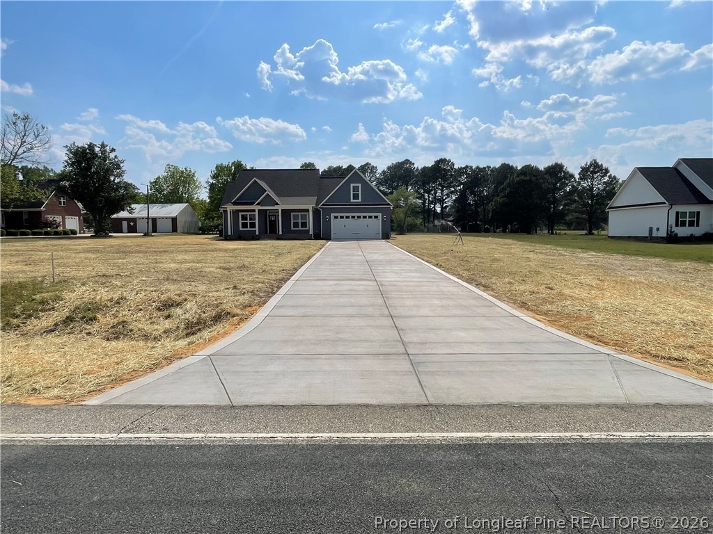 2677 Smith Mill Road Lumberton, NC 28358 - Photo 1 of 27 a view of house with outdoor space