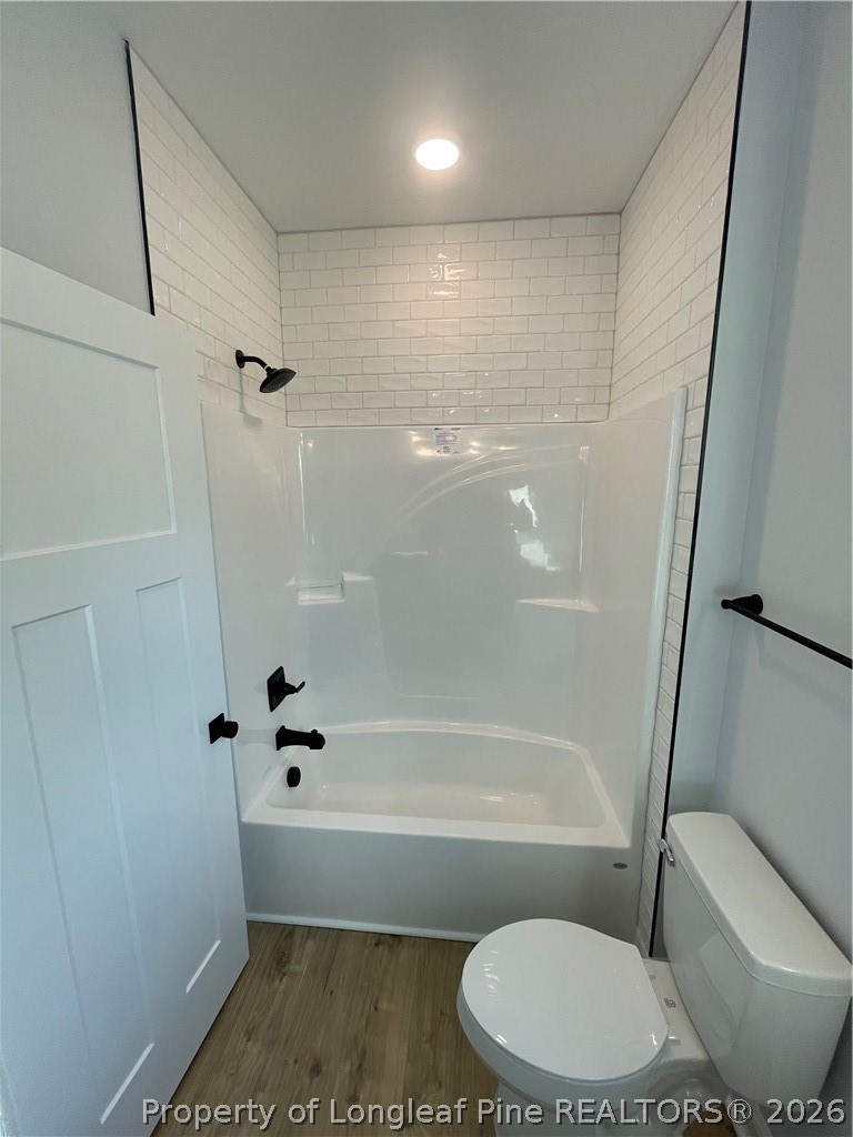 2677 Smith Mill Road Lumberton, NC 28358 - Photo 11 of 27 a bathroom with a toilet and a bath tub