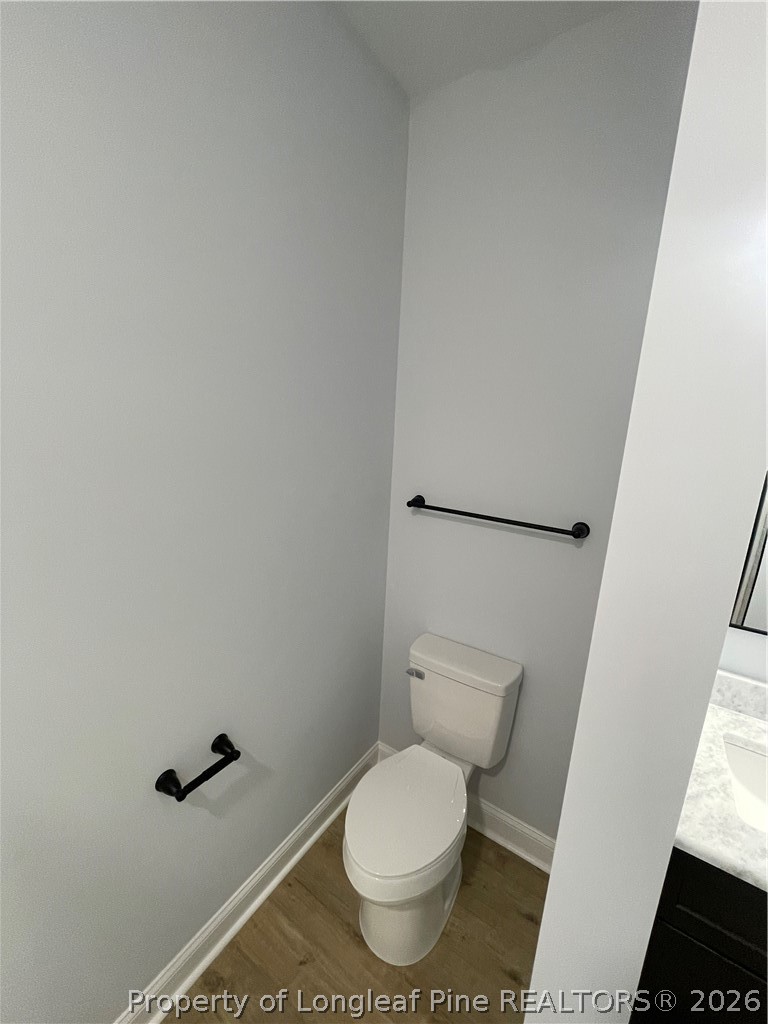 2677 Smith Mill Road Lumberton, NC 28358 - Photo 17 of 27 a white toilet sitting next to a shower