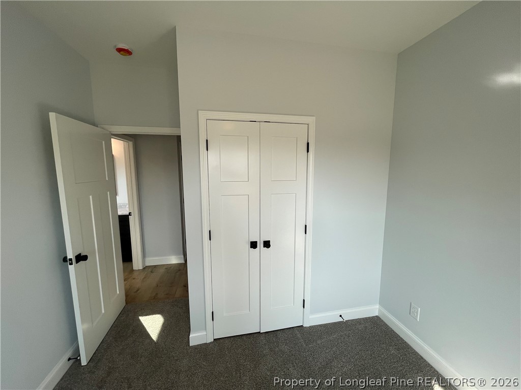 2677 Smith Mill Road Lumberton, NC 28358 - Photo 10 of 27 wooden floor in a hall with an entryway