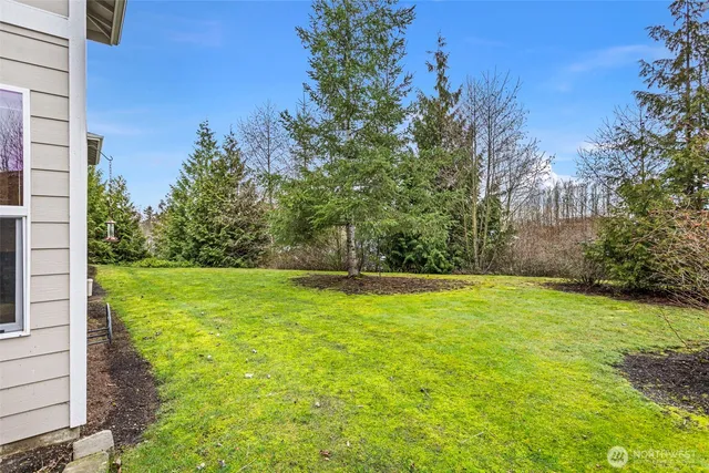 a view of a house with a big yard