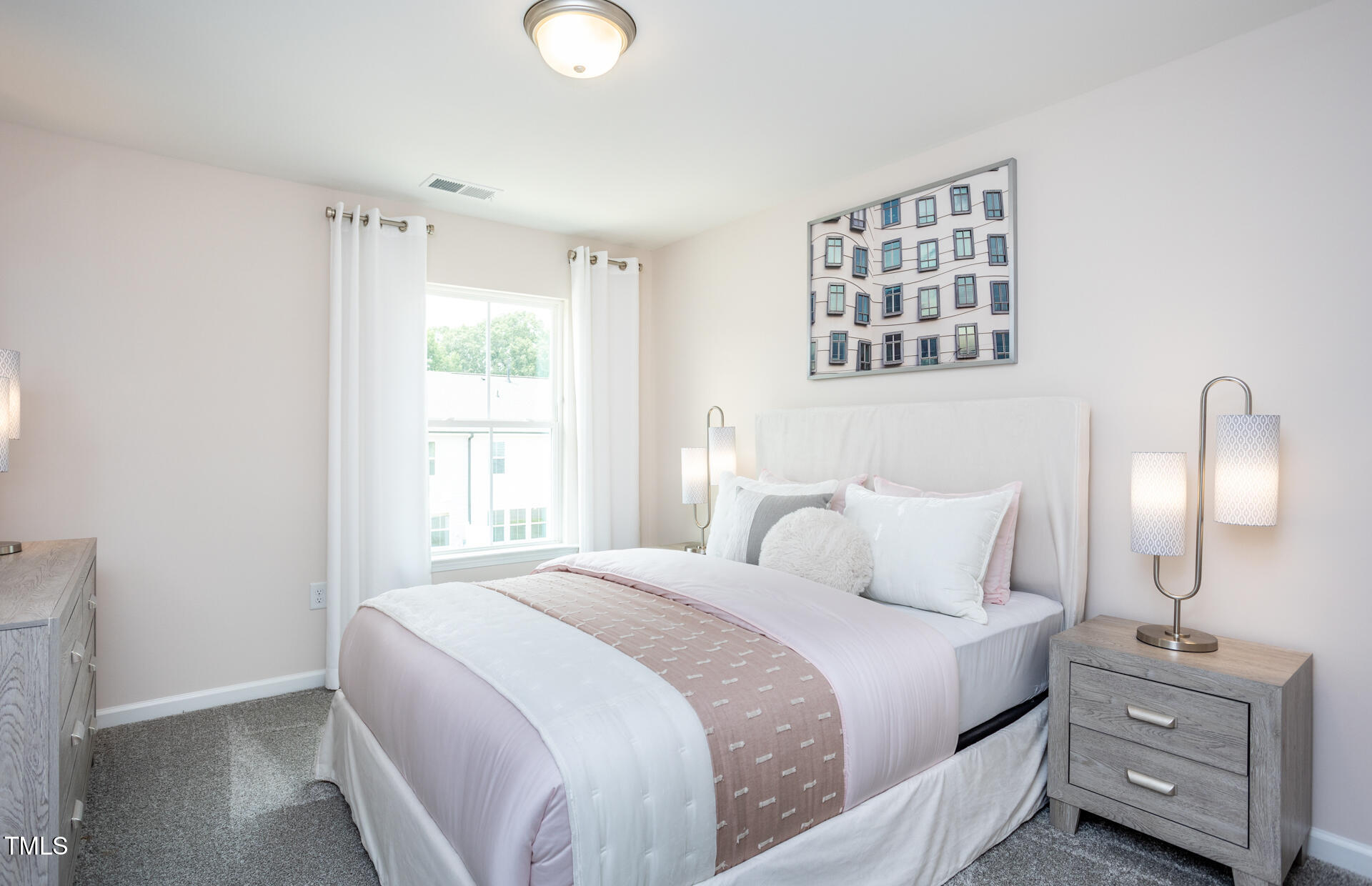 2919 Denson Road Fuquay-Varina, NC 27526 - Photo 14 of 26 a bedroom with a bed and a window