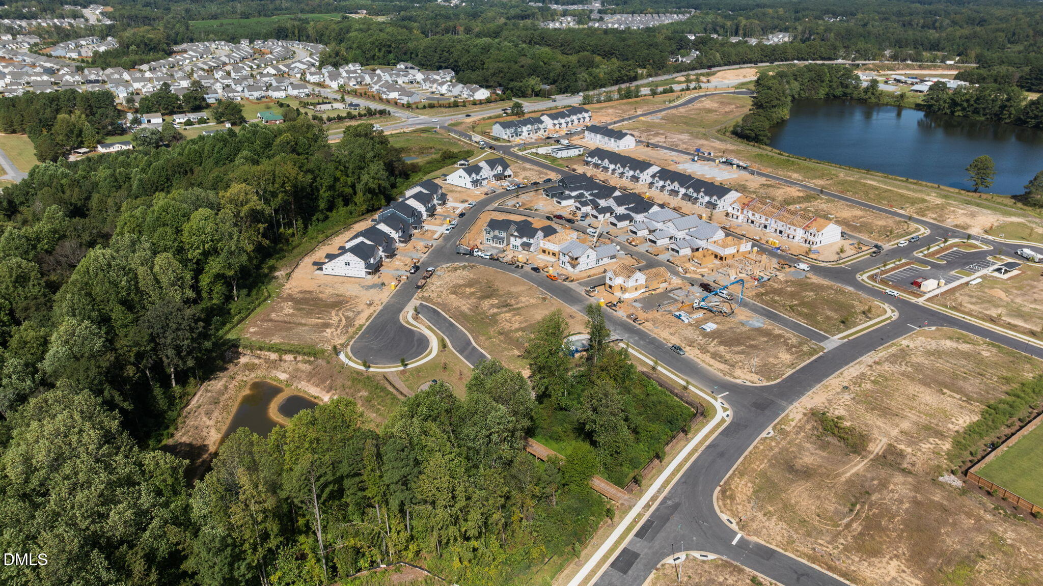 2919 Denson Road Fuquay-Varina, NC 27526 - Photo 23 of 26 an aerial view of residential houses with outdoor space
