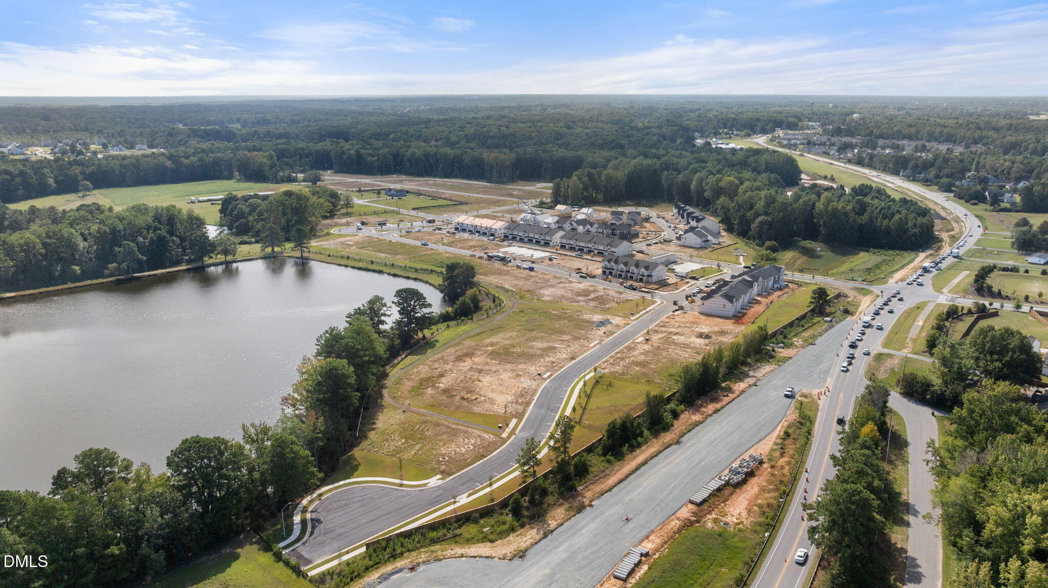 2919 Denson Road Fuquay-Varina, NC 27526 - Photo 24 of 26 an aerial view of residential houses with outdoor space
