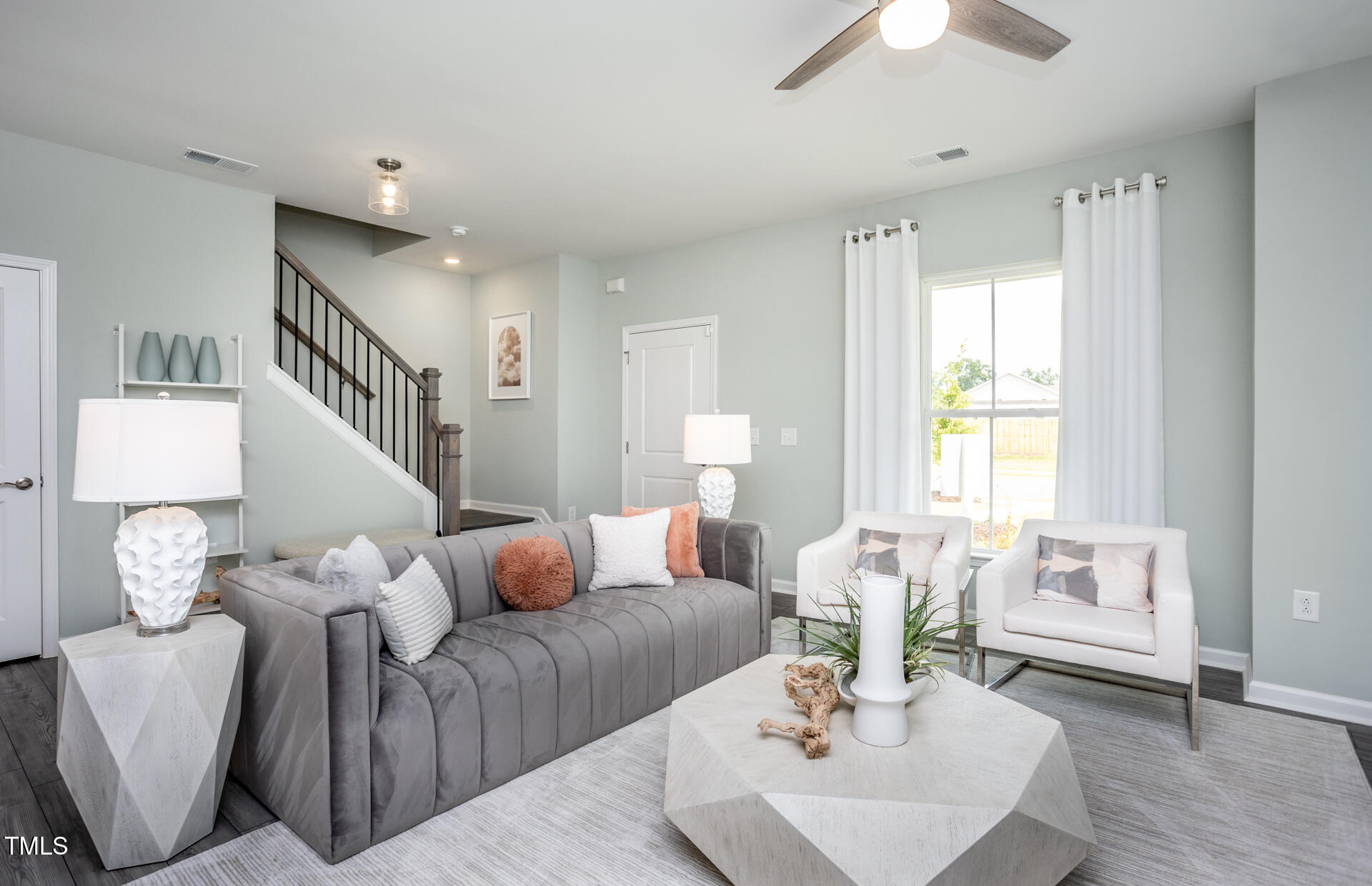 2919 Denson Road Fuquay-Varina, NC 27526 - Photo 7 of 26 a living room with furniture and a large window