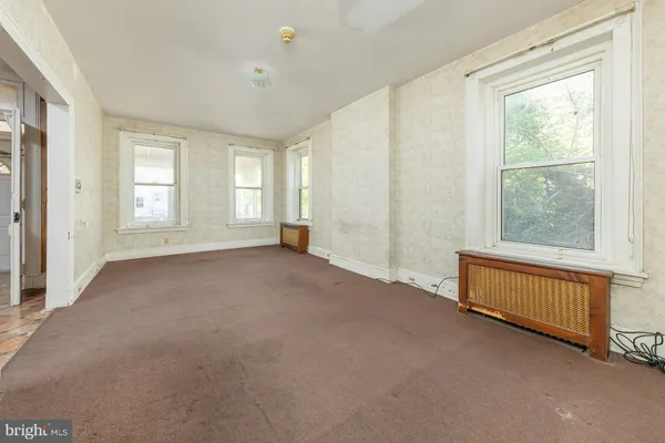 an empty room with windows