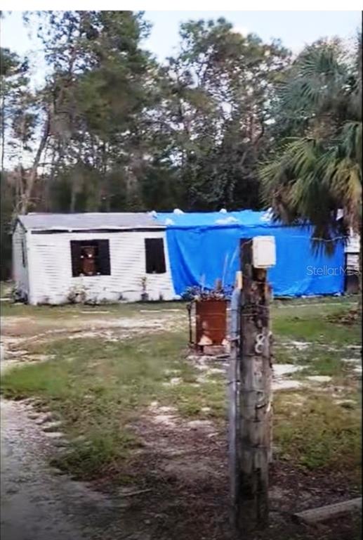 16842 Diagonal Road Hudson, FL 34667 - Photo 1 of 17 a view of a house with pool