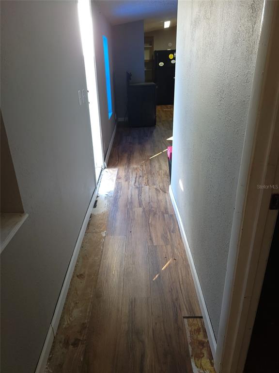 16842 Diagonal Road Hudson, FL 34667 - Photo 16 of 17 wooden floor in a gallery